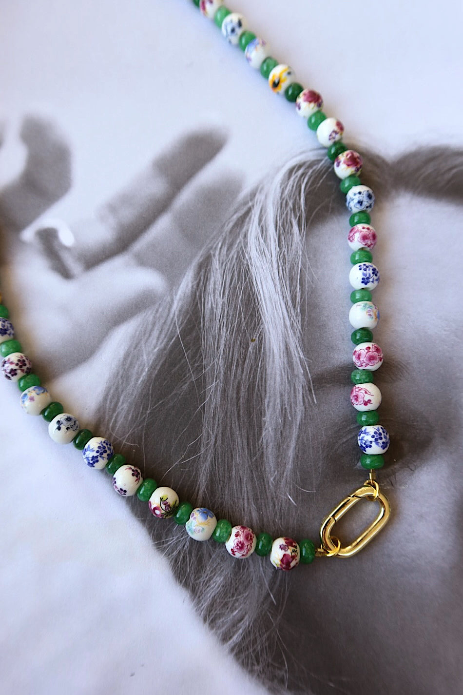 FLORAL BEADED CHARM HOLDER