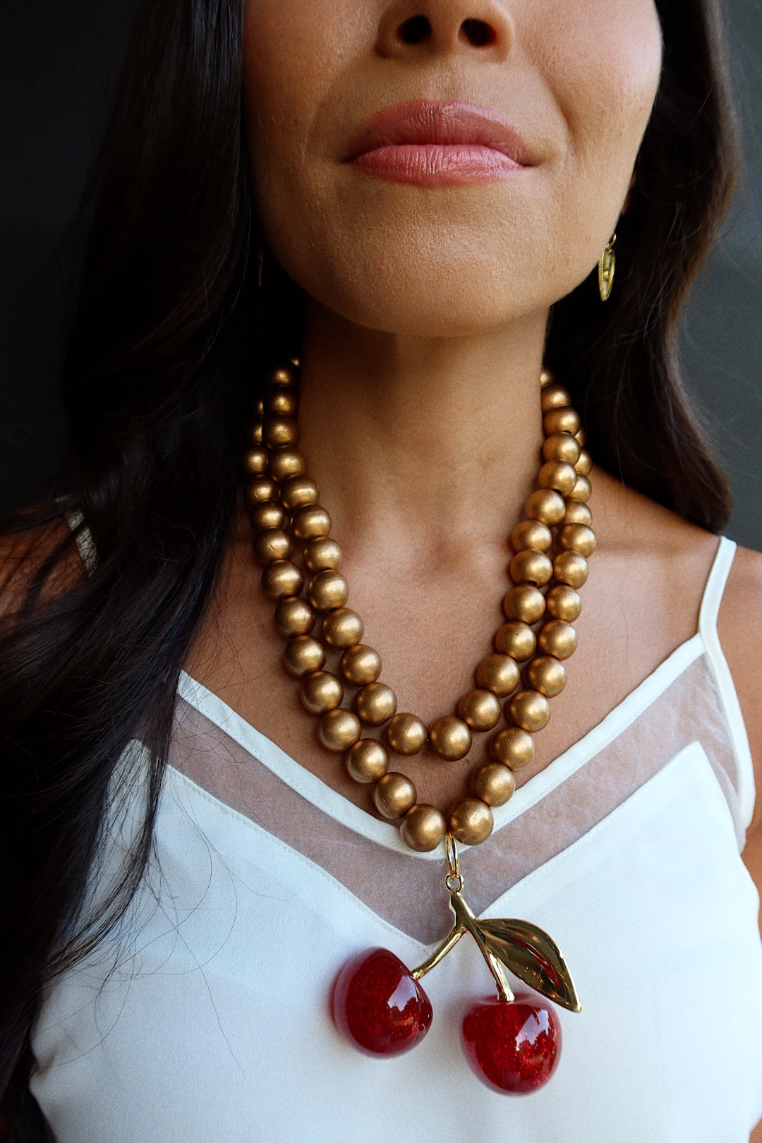 CHERRY BOMB (GOLD WOOD BEADS)