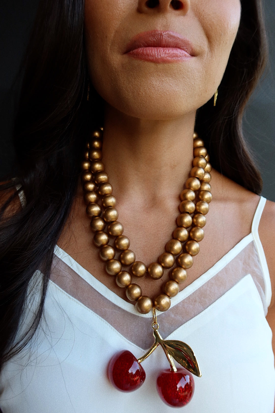 CHERRY BOMB (GOLD WOOD BEADS)